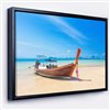 Designart 18-in x 34-in Tropical Beach with Boat Canvas Wall Panel with Black Wood Frame