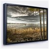 Designart 18-in x 34-in Light in Pier in Brown Lake with Black Wood Framed Wall Panel