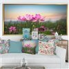 Designart 28-in x 60-in Blooming Lotus Flowers at Sunset with Gold Wood Framed Canvas Art Print