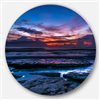 Designart 23-in x 23-in Round Exotic Dark Blue Coquina Dawn' Beach Photo Metal Circle Wall Art