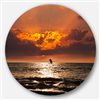 Designart 11-in x 11-in Sunset Beach with Distant Sail Boat Metal Circle Art