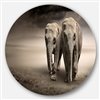 Designart 23-in x 23-in Elephant Pair in Motion Metal Circle Wall Art